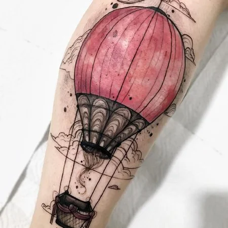 Colorful balloon tattoo on leg for men