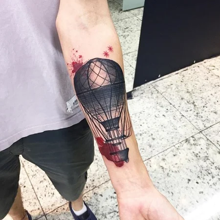 Balloon tattoo on forearm for men