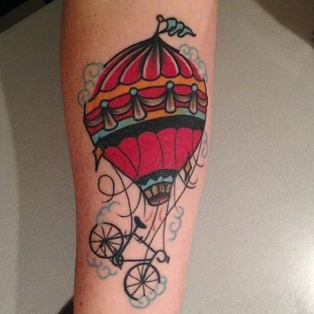 Balloon tattoo on forearm for men