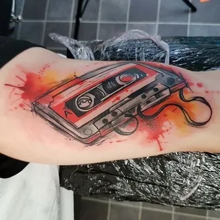 Cassette tape tattoo on the arm for men