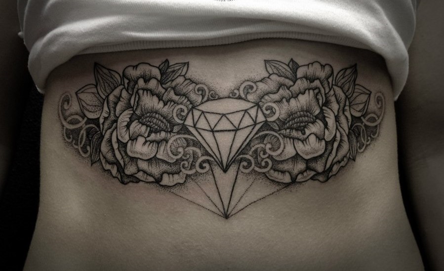 Diamond tattoo on belly for women