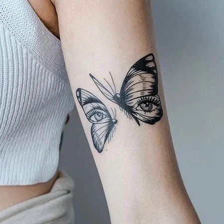 Eye tattoo on the shoulder for women