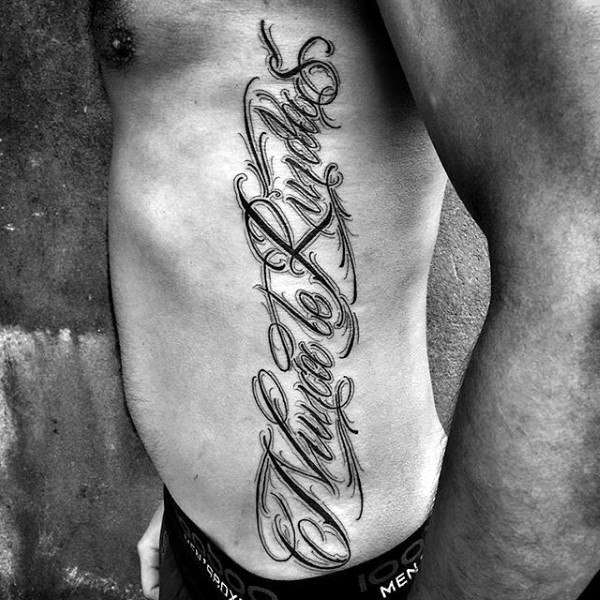 Lettering style tattoo on the side for men