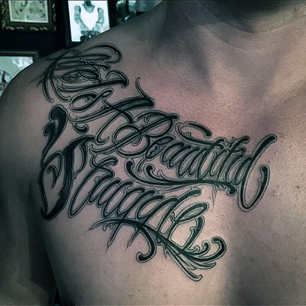 Lettering style tattoo on the chest for men