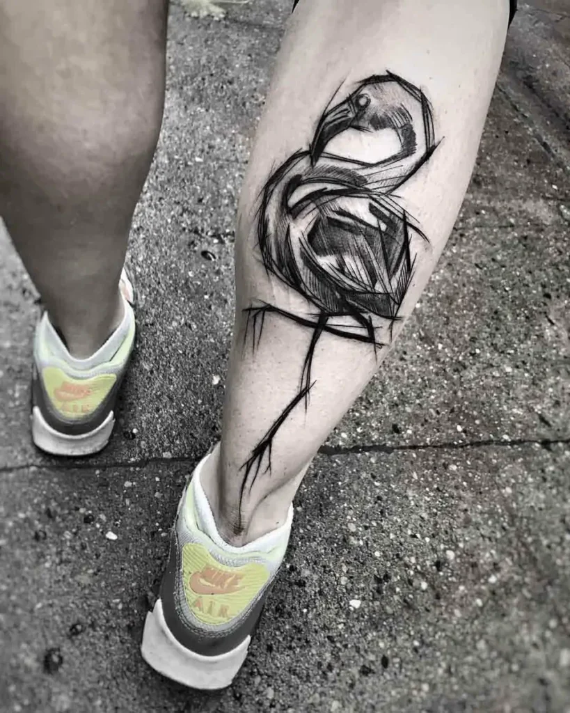 Sketch style flamingo tattoo on calf for men