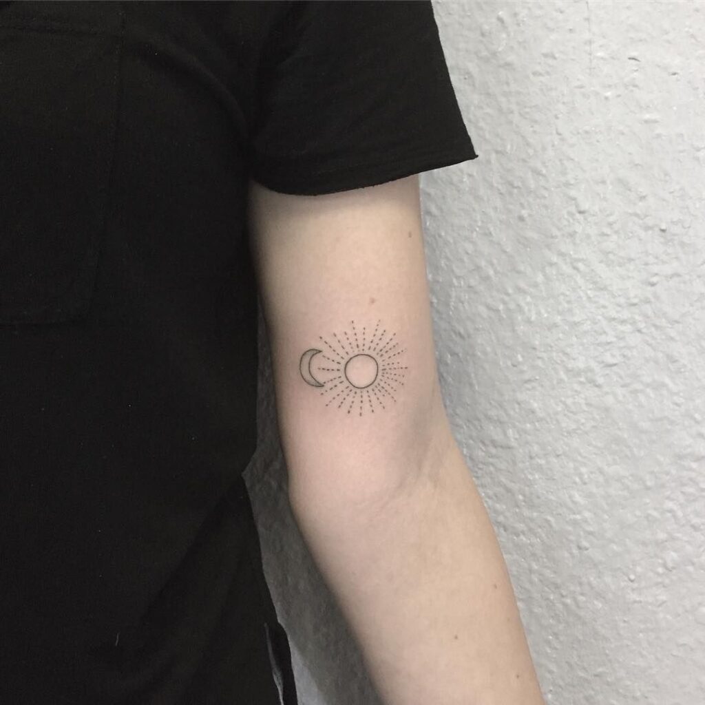 Minimalist tattoo on the shoulder for women