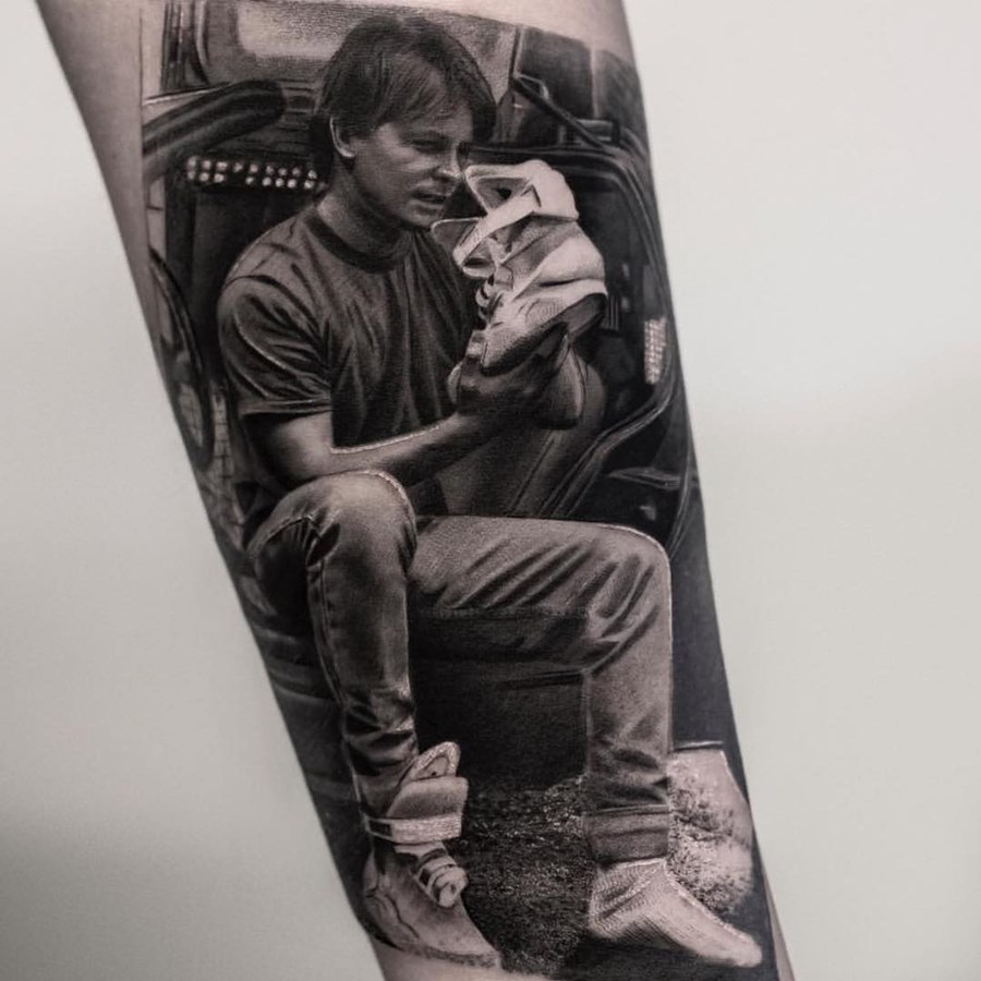 Realism style tattoo on forearm for men