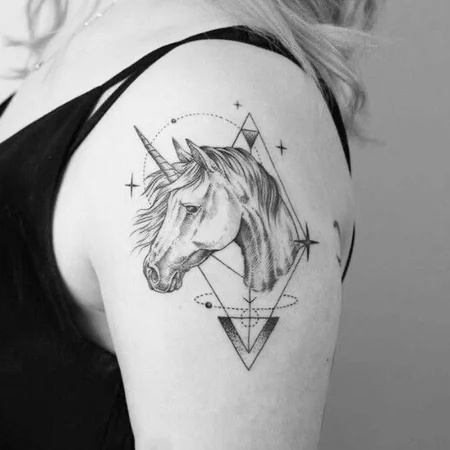 Unicorn tattoo on shoulder for women