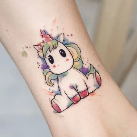 Unicorn tattoo on shin for women