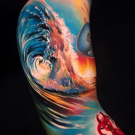 Wave tattoo on the arm for men