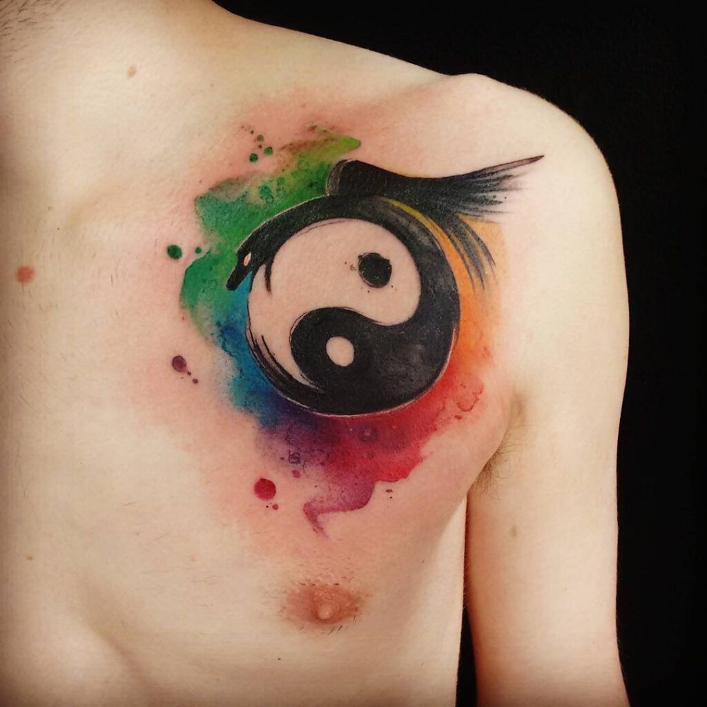 Yin-yang tattoo on chest for men