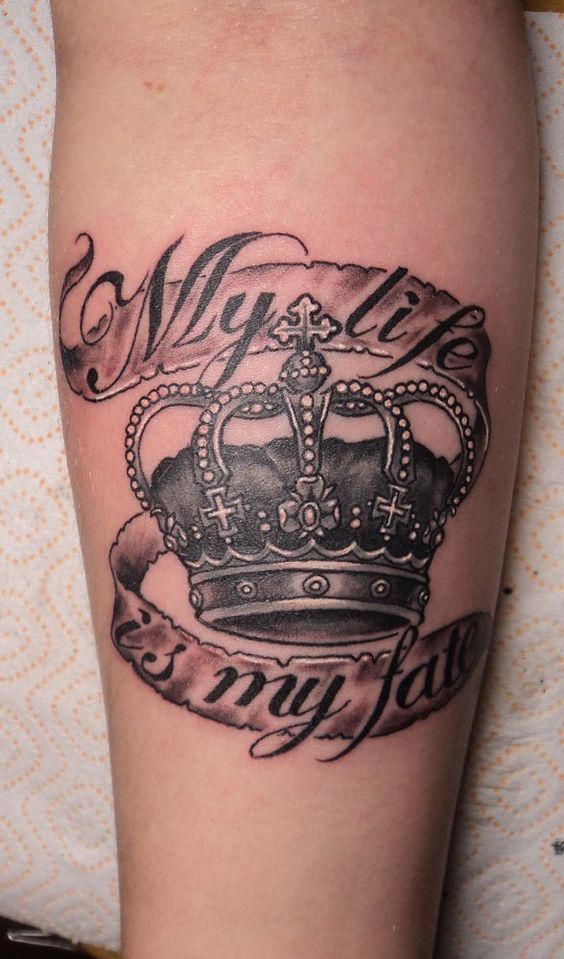 Crown tattoo on the arm for men