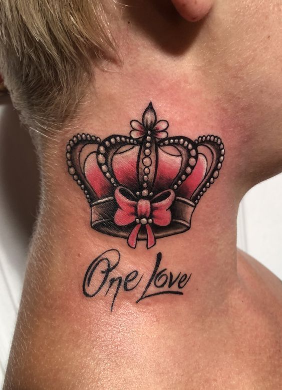 Crown tattoo with inscription on the neck for men