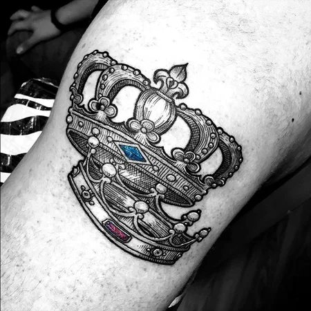 Crown tattoo on leg for men