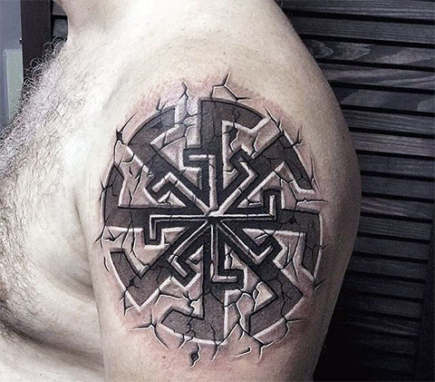 Kolovrat tattoo on the shoulder for men