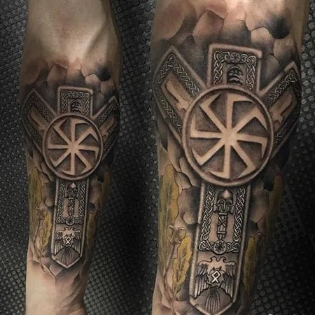 Kolovrat tattoo on arm for men