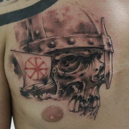 Kolovrat tattoo on chest for men