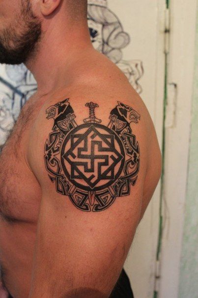 Kolovrat tattoo on the shoulder for men