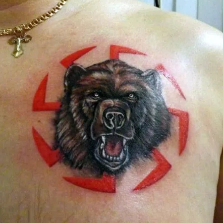 Kolovrat and bear tattoo on chest for men