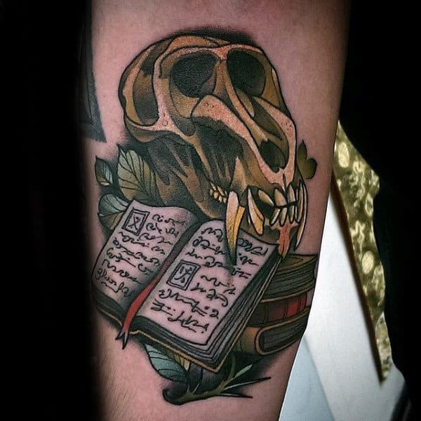 Book tattoo on forearm for men