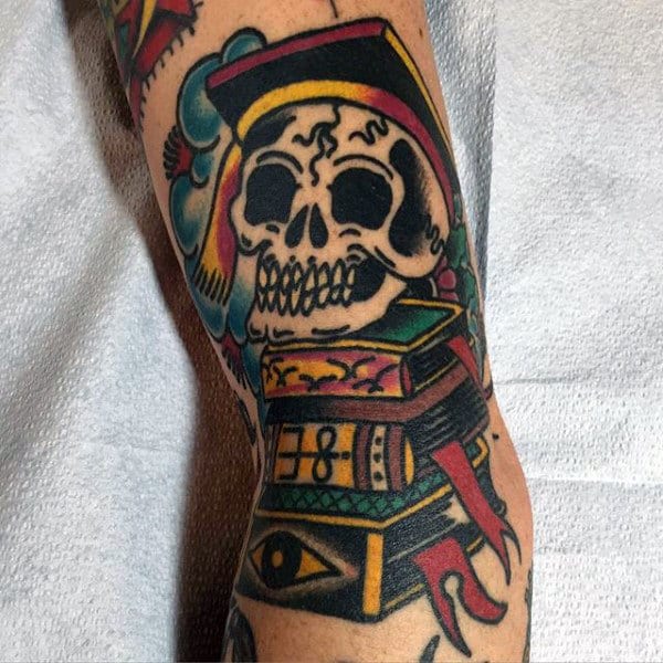 Book tattoo on leg for men