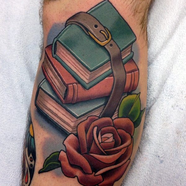 Book tattoo on leg for men