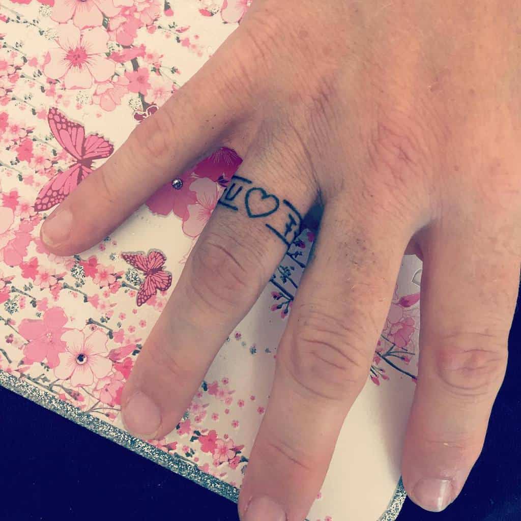 Finger ring tattoos for women