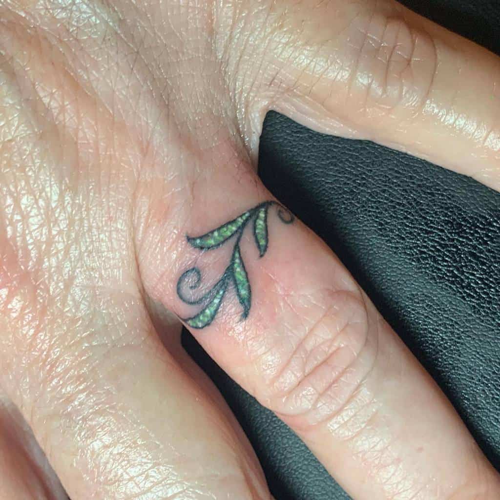 Finger ring tattoos for women