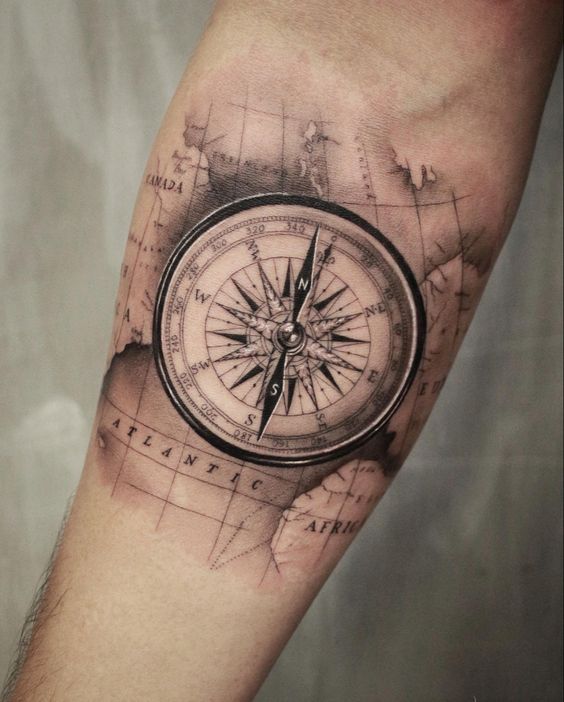 Compass tattoo on the arm for men