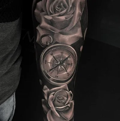 Compass and rose tattoo on forearm for men