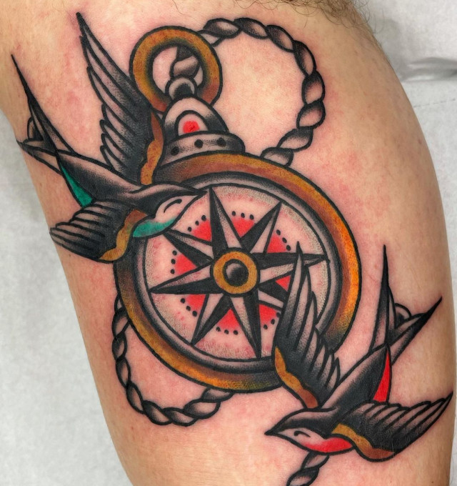 Compass tattoo on leg for men