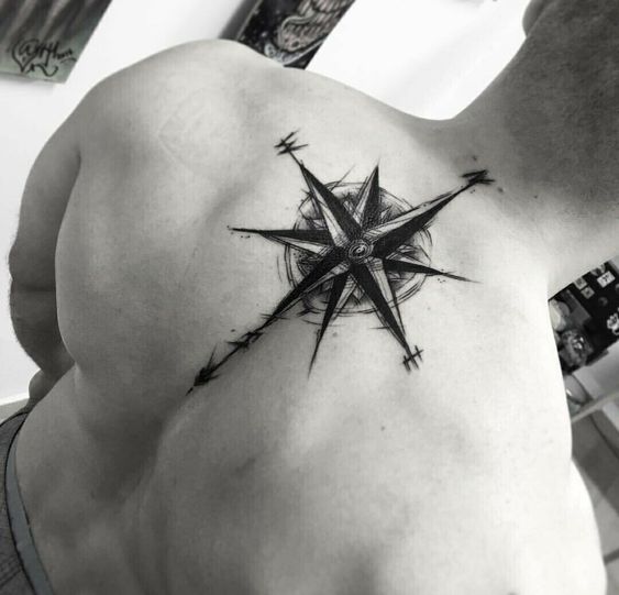 Compass tattoo on back for men