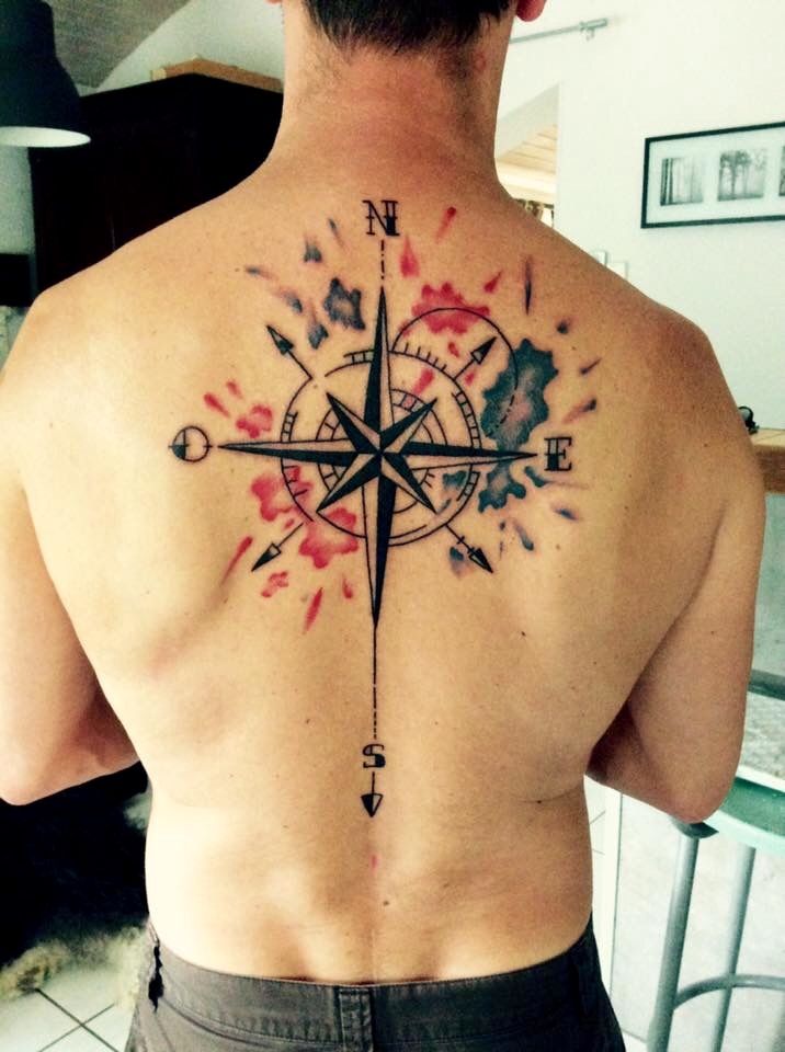 Compass tattoo on back for men