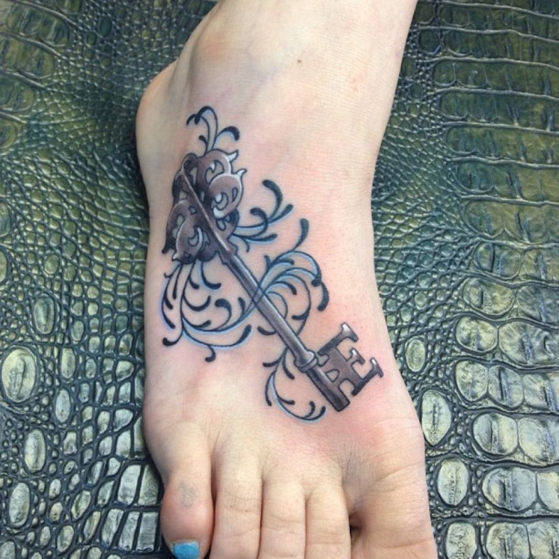 Ankle key tattoo for women