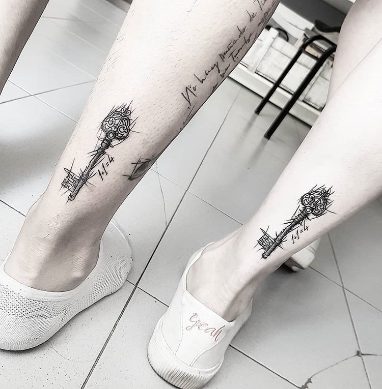 Key tattoo on the calf for men