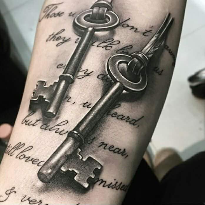 Tattoo of two keys on the arm for men