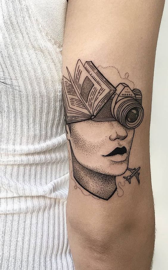 Book tattoo on the shoulder for women