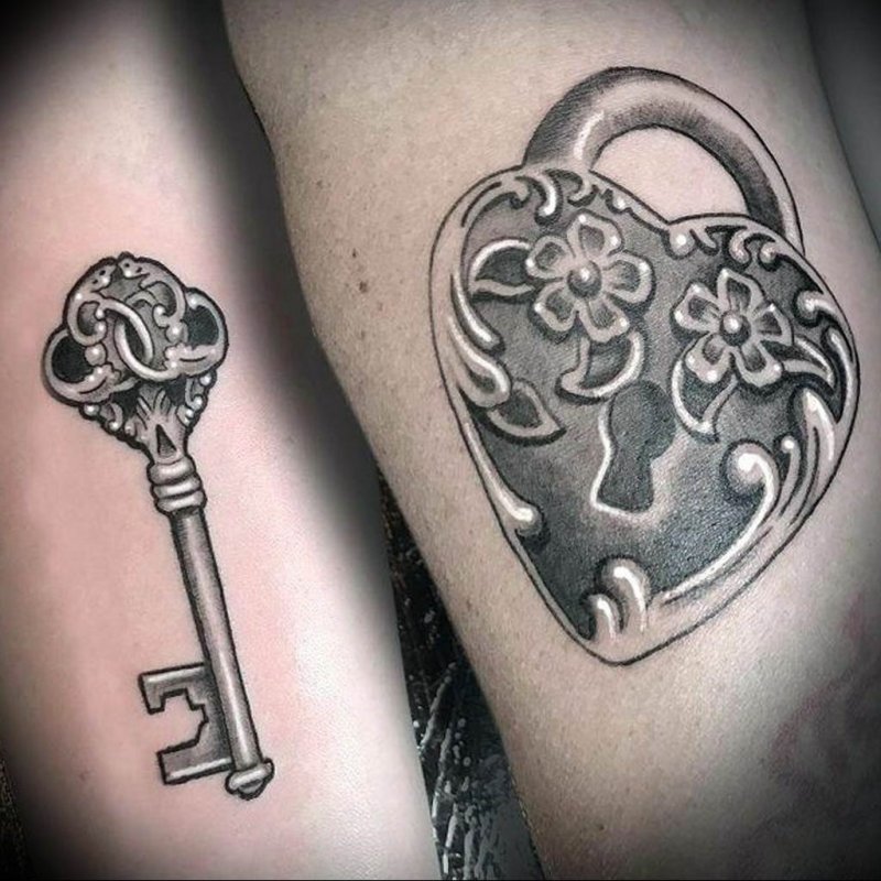 Key tattoo on the arm for women