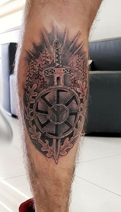 Large kolovrat tattoo on calf for men