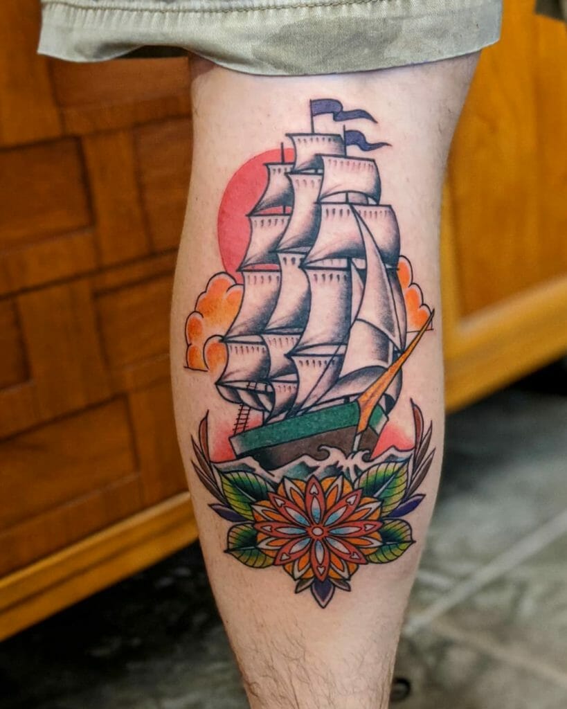 Colorful ship tattoo on the calf for men