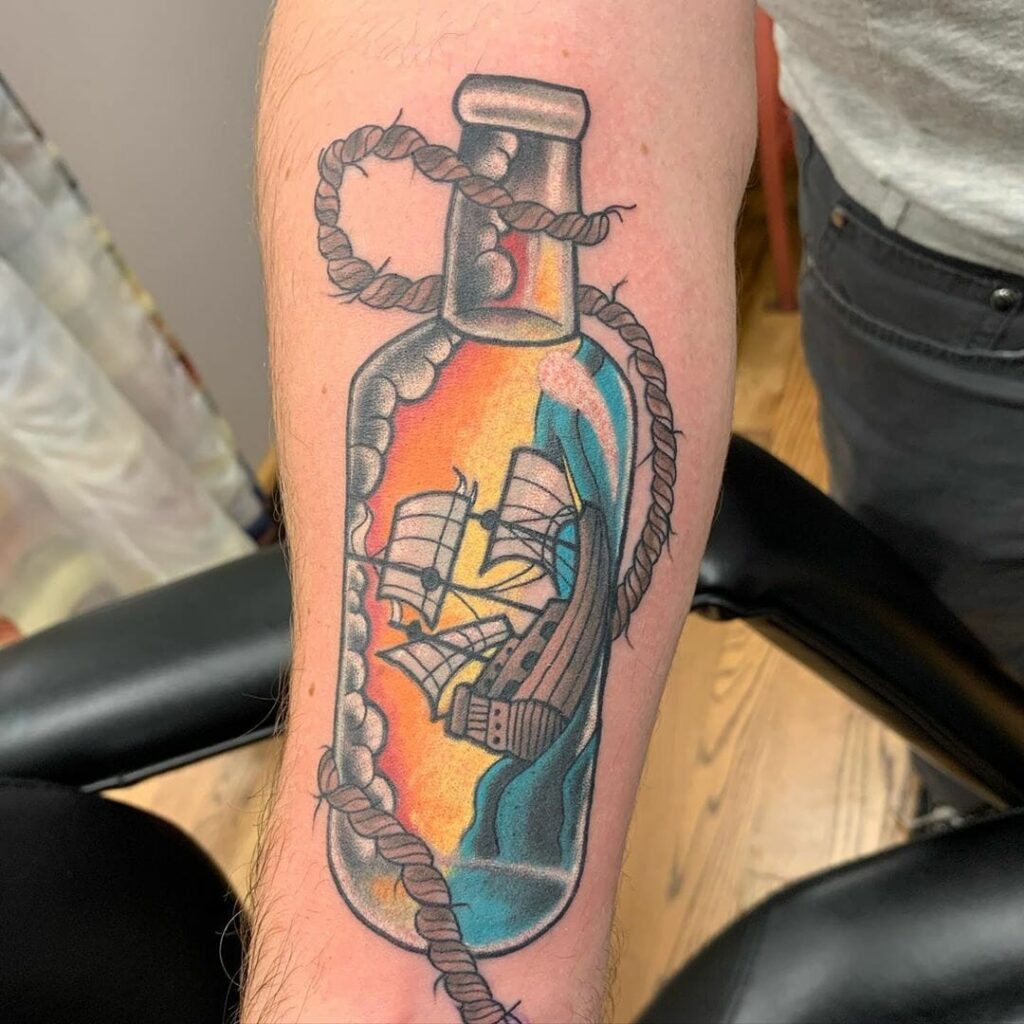 Ship tattoo on forearm for men