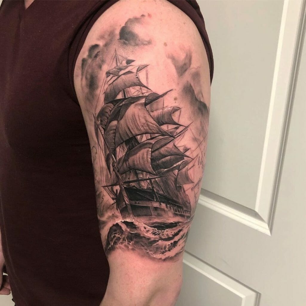 Ship tattoo on the shoulder for men