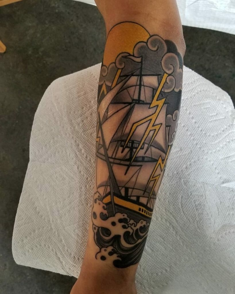 Ship tattoo on the arm for men