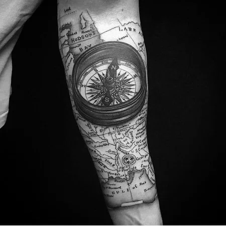 Compass tattoo on forearm for men