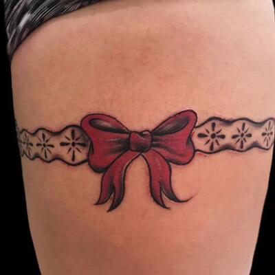 garter tattoo 75